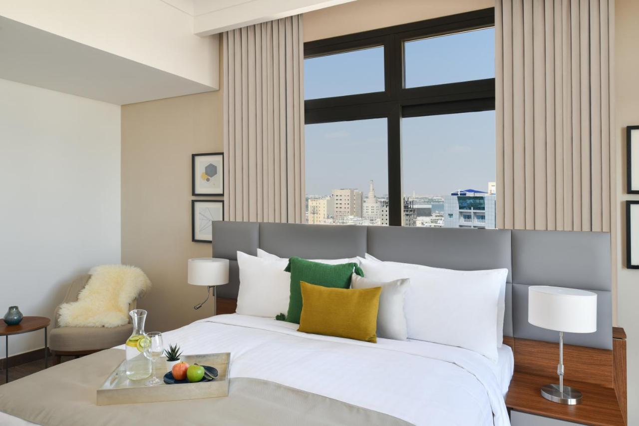 Le Mirage Downtown Apartment Доха Стая снимка