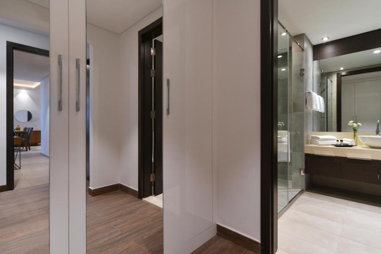 Le Mirage Downtown Apartment Доха Стая снимка