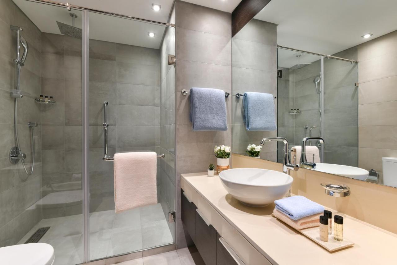 Le Mirage Downtown Apartment Доха Стая снимка
