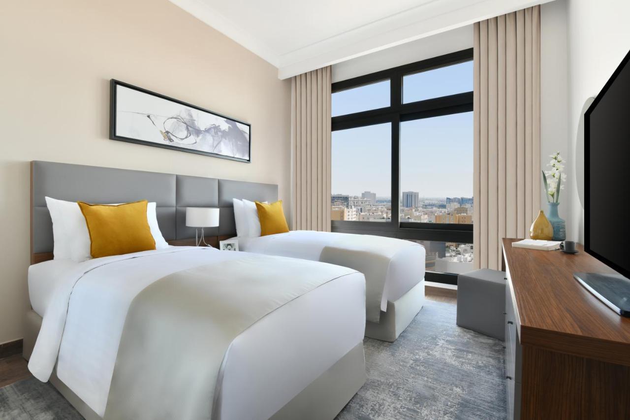 Le Mirage Downtown Apartment Доха Стая снимка